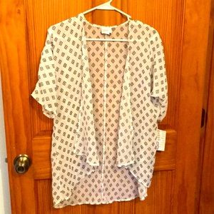LuLaRoe black and white sheer top.
